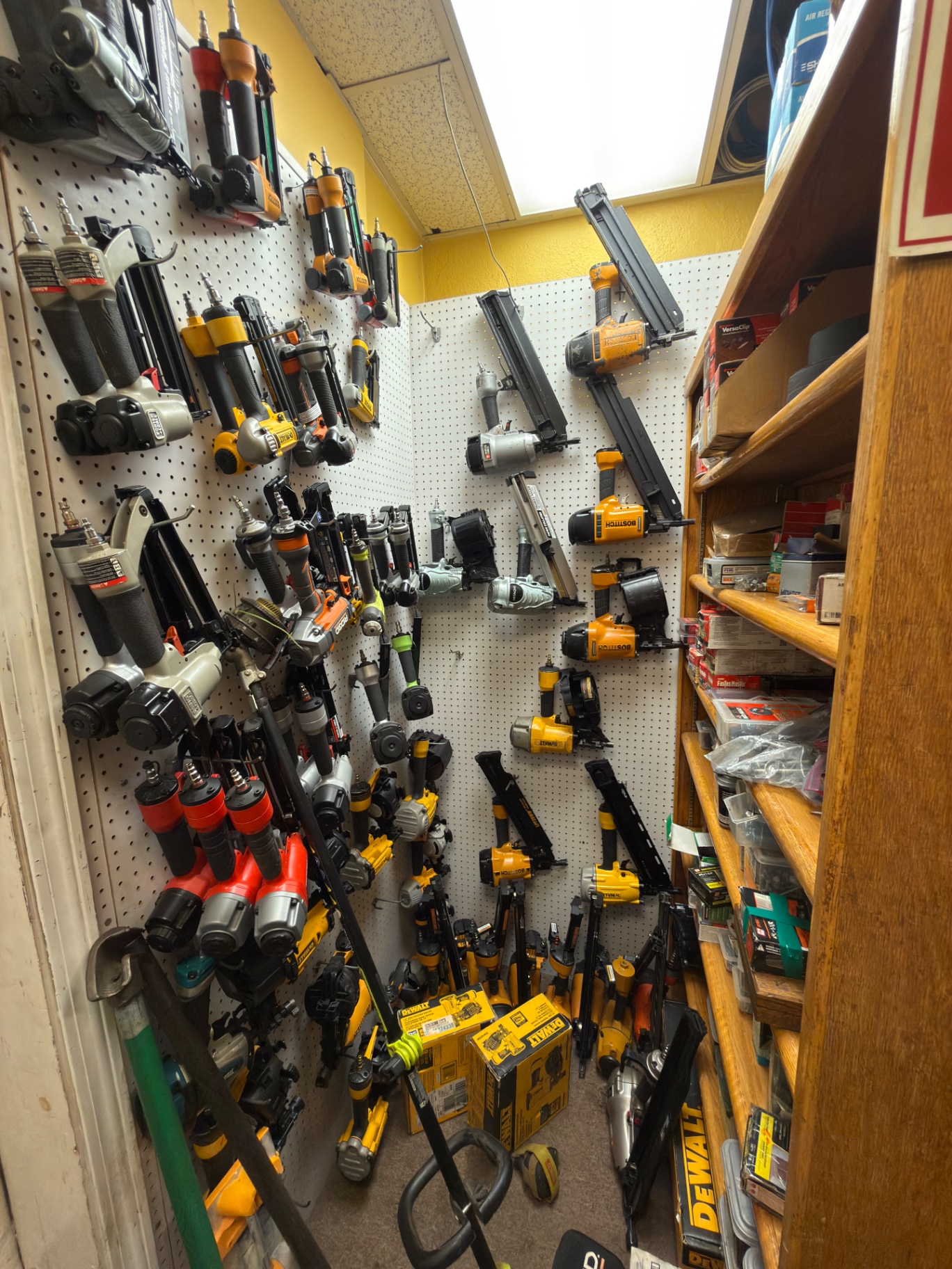 Wall of pneumatic nail guns and staplers