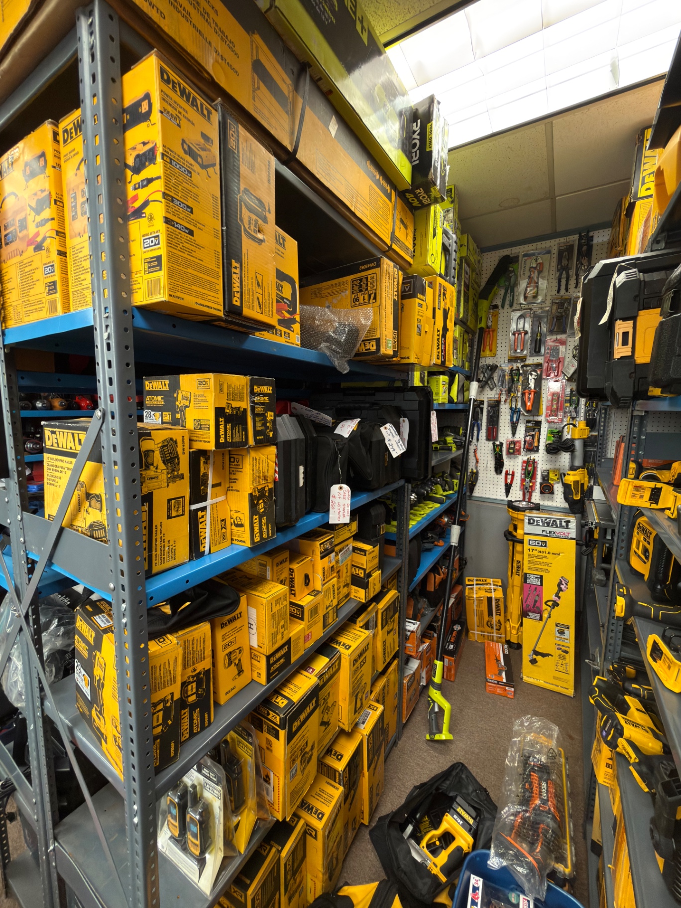 Shelves stocked with DeWalt power tool boxes